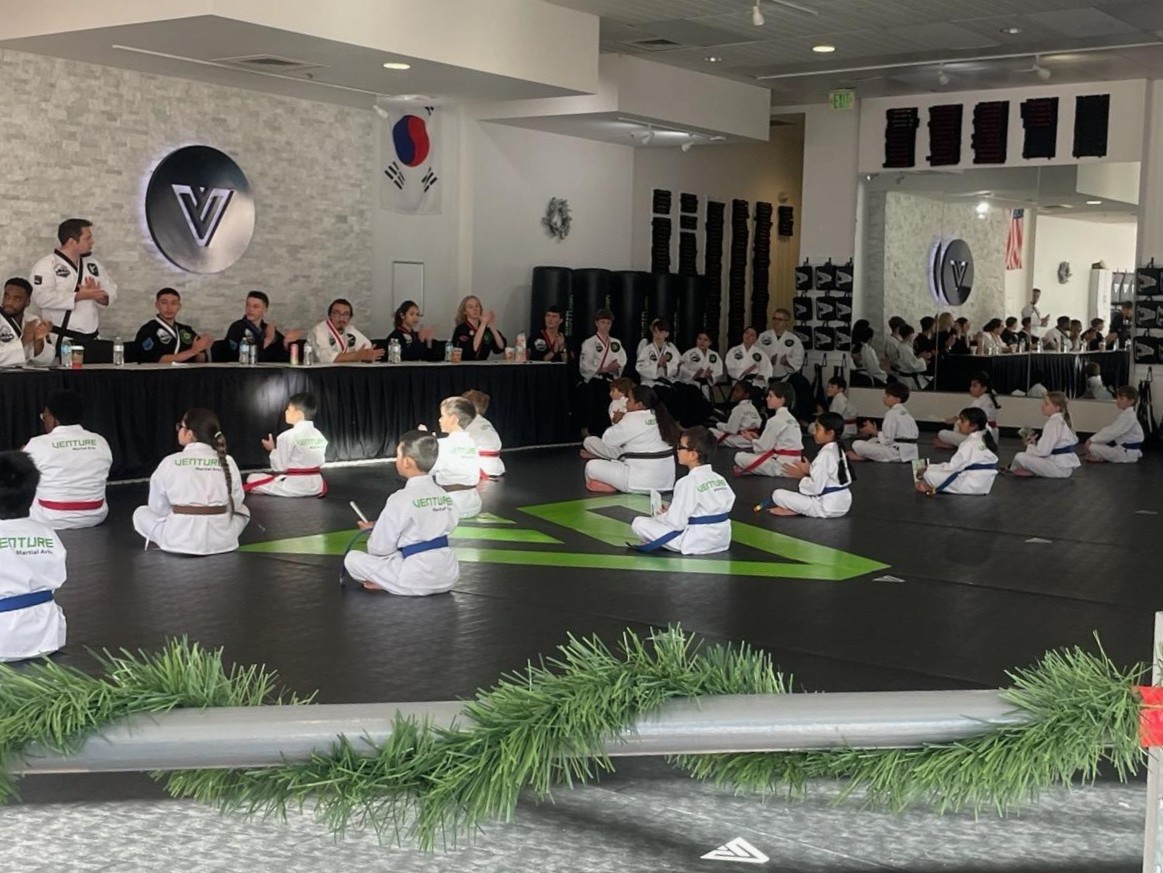 children sitting at venture martial arts