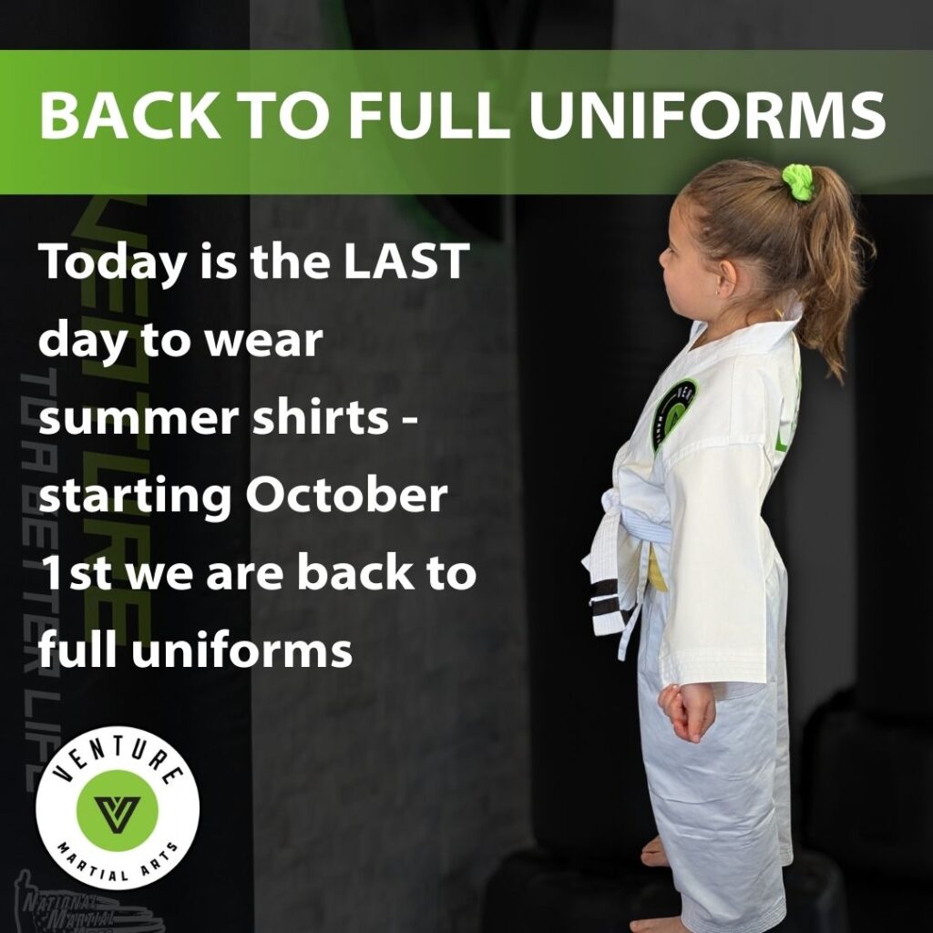 Child in a martial arts uniform standing with a serious expression, ready for training at Venture Martial Arts.
